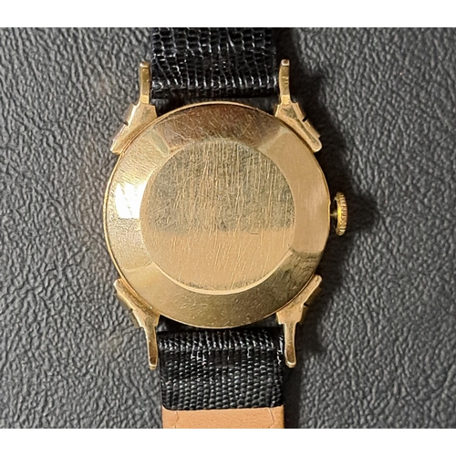 132 - GENTLEMAN'S LONGINES FOURTEEN CARAT GOLD CASED WRISTWATCH
circa 1950, the black dial with Arabic num... 