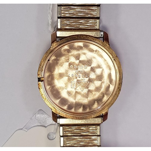 58 - GENTLEMEN'S 1970s OMEGA DE VILLE NINE CARAT GOLD CASED WRISTWATCH
the champagne dial with baton five... 