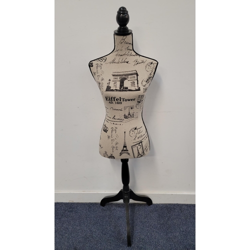 438 - WOMENS TORSO MANNEQUIN
covered in black and white fabric, with ebonised wooden finial and raised on ... 