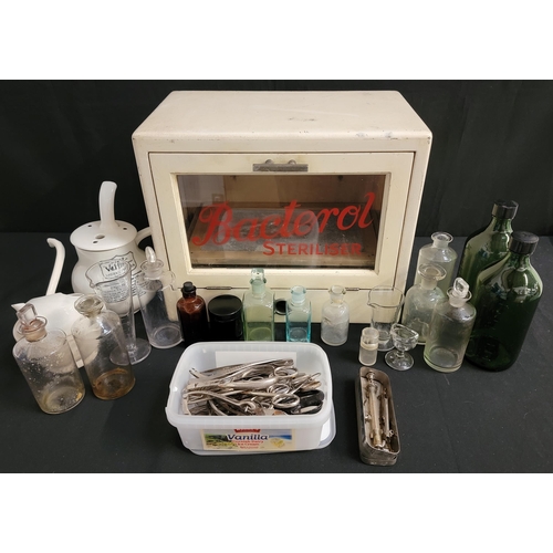 476 - VINTAGE BACTEROL TABLE TOP STERILISER
with a selection of podiatry clippers, scissors, tweezers and ... 