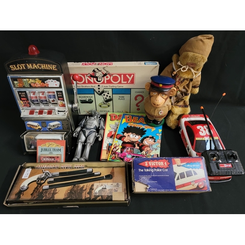 538 - SELECTION OF TOYS 
including 'Z Victor 4' talking police car; boxed Monopoly; Dr Who Cyberman figure... 