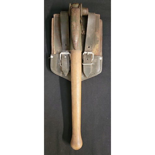 559 - 1964 WEST GERMAN GERMAN MILITARY ENTRENCHING TOOL
the folding shovel / pick is complete with origina... 