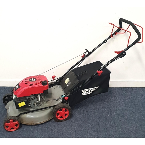 428 - XCEED PETROL LAWN MOWER 
model number EX46SLM, with 139cc 4-stroke engine and 46cm blade, with colle... 