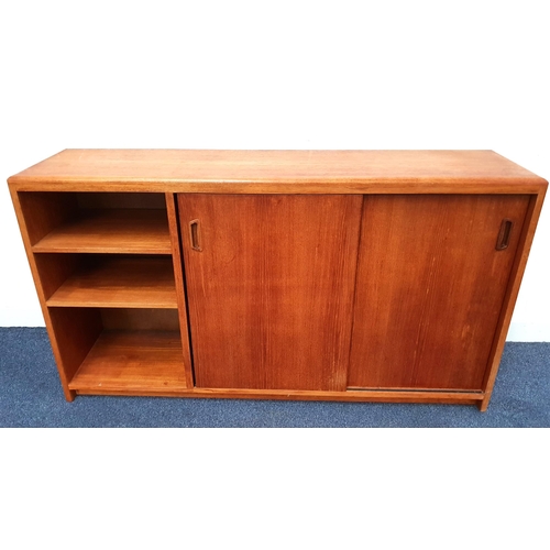 669 - MID-CENTURY TEAK SIDE CABINET
the double sliding doors with shelving within and flanked by open shel... 