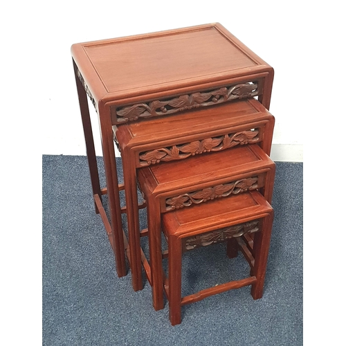 682 - A CHINESE STYLE BAMBOO EFFECT CARVED HARDWOOD NEST OF FOUR TABLES
the largest 49cm x  66 X 35cm