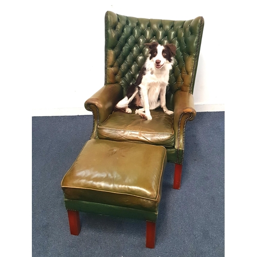 731 - GREEN LEATHER CHESTERFIELD STYLE WING BACK ARM CHAIR
the curved button back with stud edge detail, t... 