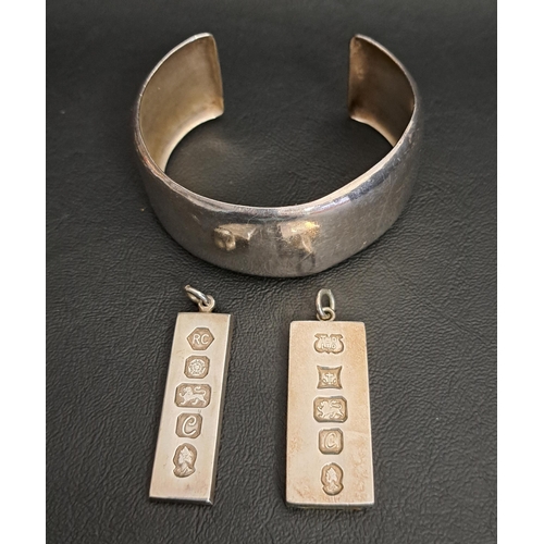 2 - THREE PIECES OF SILVER JEWELLERY
comprising two silver ingot pendants, one hallmarked Birmingham 197... 