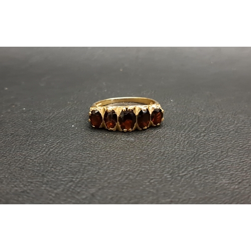 3 - FIVE STONE GARNET RING
on nine carat gold shank, ring size S