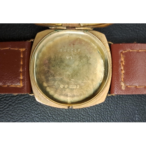 194 - GENTLEMAN'S NINE CARAT GOLD CASED WRISTWATCH
circa 1940s, the dial with Arabic numerals and subsidia... 