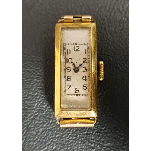 228 - LADIES EIGHTEEN CARAT GOLD CASED WRISTWATCH
circa 1930s, the rectangular dial with Arabic numerals, ... 