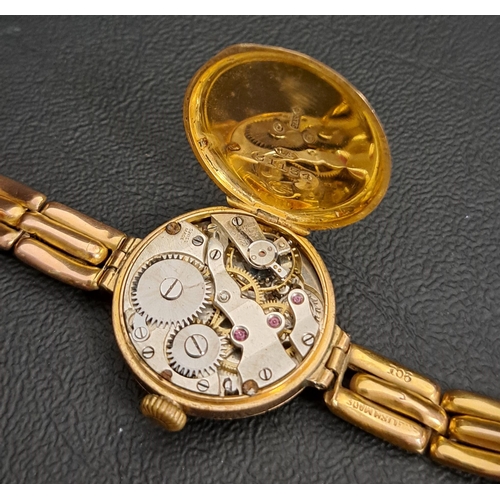 237 - LADIES NINE CARAT GOLD WRISTWATCH
circa 1920s, the dial with Roman numerals, on nine carat gold brac... 