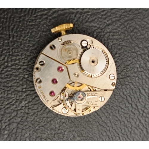 240 - LADIES NINE CARAT GOLD CASED WRISTWATCH
circa 1940s, the dial with Arabic numerals and subsidiary se... 