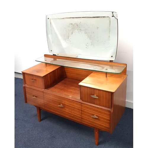 LEBUS MID CENTURY DESIGN DRESSING TABLE
the mirror above a glass shelf with an arrangement of four drawers below, raised on tapered legs, 108 x 126 x 45cm
Note: See matching next lot for matching Lebus wardrobes