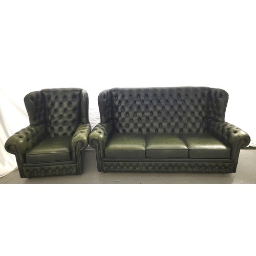 730 - GREEN LEATHER CHESTEFIELD STYLE THREE SEAT WING BACK SOFA AND ARMCHAIR
both with button back and arm... 