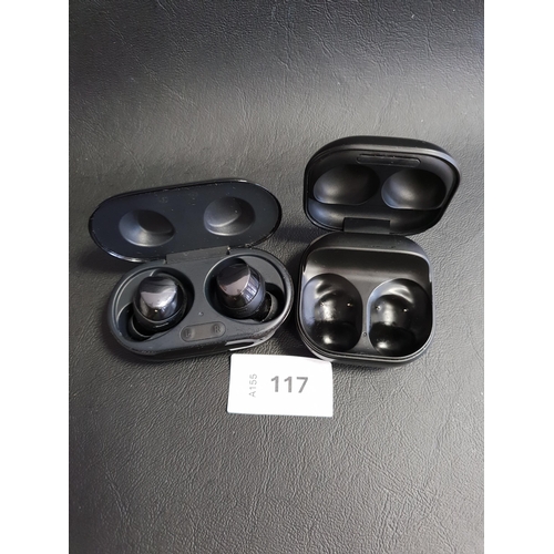 117 - PAIR OF SAMSUNG EARBUDS
in charging case, model SM-R175; and a Samsung earbud charging case (for SM-... 