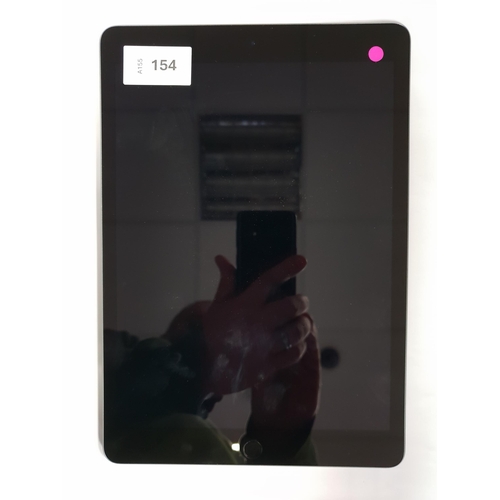 154 - APPLE IPAD 9TH GEN - A2602 - WIFI 
serial number Q6HW24T1D7. Apple account locked. 
Note: It is the ... 