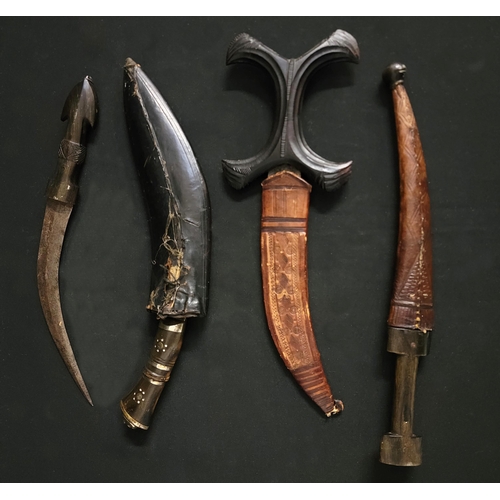 451 - SMALL COLLECTION OF INTERESTING DAGGERS
comprising African style tribal dagger, with X-form hilt and... 