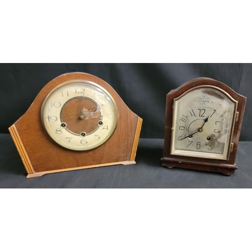 PAIR OF WOODEN MANTEL CLOCKS
comprising a mid 1900s Smiths Art Deco 3 Train Westminster floating balance mantel clock; and a Tempus Fugit mantel clock, the largest 22.5cm high