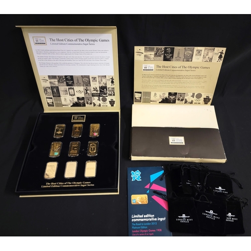 545 - THE HOST CITIES OF THE OLYMPIC GAMES COMMEMORATIVE INGOT SET
comprising twenty seven gold plated ing... 