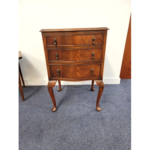 647 - SMALL MAHOGANY REPRODUCTION THREE DRAWER CABINET
with serpentine front and cabriole legs, 49 x 75 x ... 