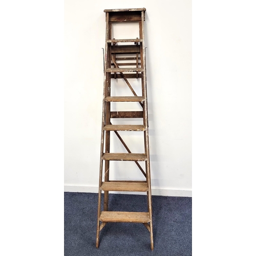 695 - OLD SET OF WOODEN FOLDING STEP LADDERS
paint splattered, with seven steps to platform 218cm high