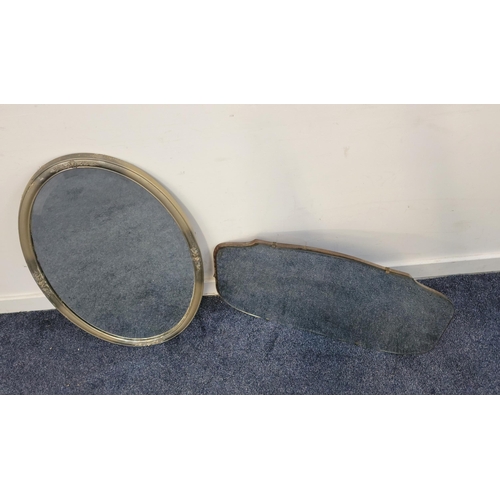 697 - VINTAGE BEVEL EDGE MIRROR
40 x 67 cm; together with silver framed oval bevel edge wall mirror 
(2)