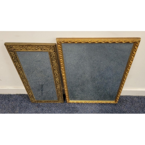 698 - BRASS EDGED ARTS AND CRAFTS WALL MIRROR
with bevel edge, the frame with berries and foliage, 62 x 27... 