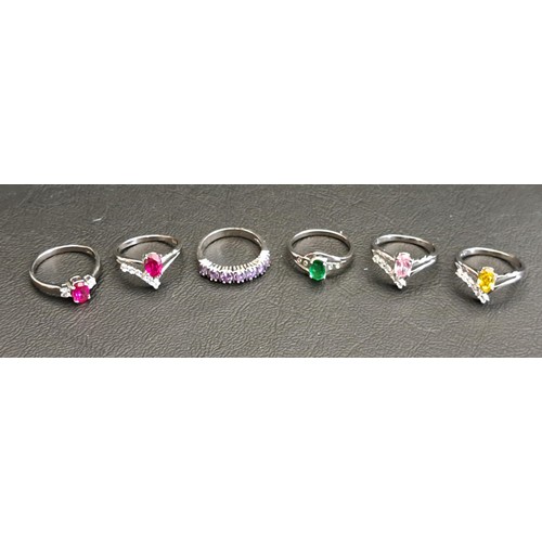 101 - FIVE GEM AND CZ SET EIGHTEEN CARAT GOLD PLATED RINGS
the gemstones including citrine, ruby and ameth... 