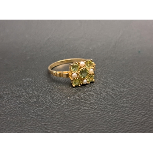 PERIDOT AND SEED PEARL CLUSTER RING
the five peridots and four seed pearls in square setting, on nine carat gold shank, ring size O