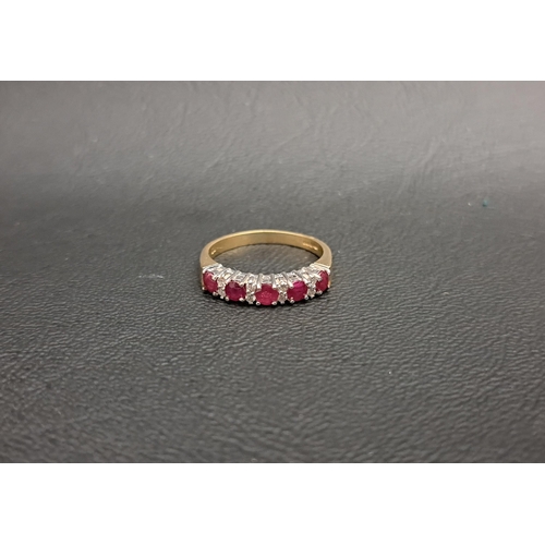 29 - RUBY AND DIAMOND RING
the five round cut rubies separated by double diamond spacers, on nine carat g... 