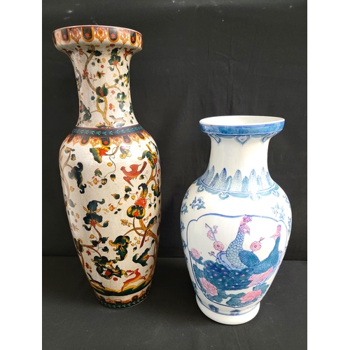 341 - TWO LARGE CHINESE VASES
The largest featuring pheasants, deer, parrots and foliage on heavy crazed g... 