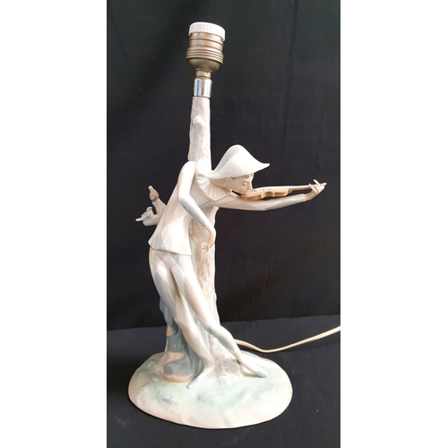 360 - A LLADRO TABLE LAMP
the base in the form of a Harlequin playing the Violin, 39cm high