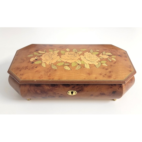 307 - SWISS REUGE MUSICAL JEWELLERY BOX
playing Barcolle by J. Offenbach, in an Italian burr maple inlaid ... 