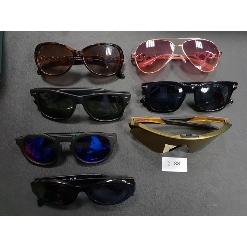 88 - SEVEN PAIRS OF DEIGNER SUNGLASSES
comprising Prada, Bench, Ben Sherman, Guess, Oakley, Tom Ford and ... 