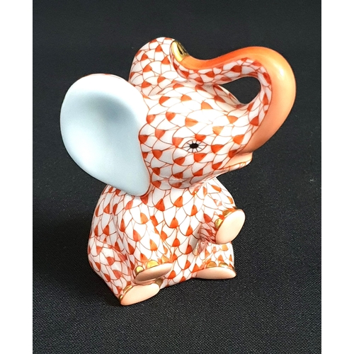 262 - HAND PAINTED HEREND PORCELAIN BABY ELEPHANT ORNAMENT
in a red Vieux Herend fish scale design, 7.2cm ... 