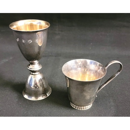 205 - TWO SILVER CUPS
consisting of a Christening cup Birmingham 1966, 101g/3.5oz; and a double ended spir... 