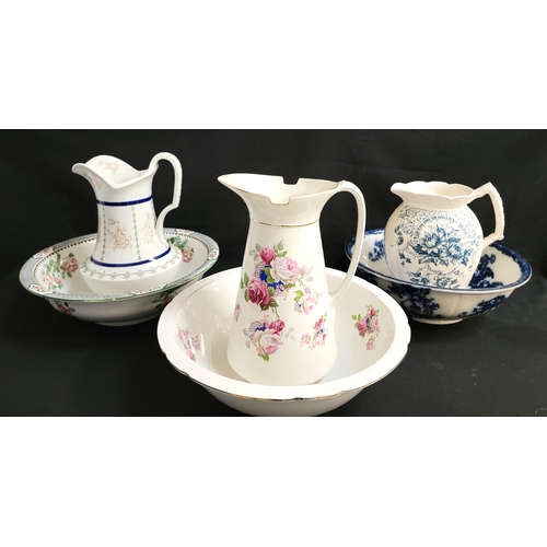 235 - SELECTION OF EWERS AND BASINS
including a matching Edwardian set with transfer print roses, a Copela... 