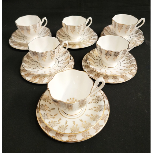 237 - BCB POTTERY CORONET TEASET
comprising six cups, six saucers and six plates, with gold decoration on ... 