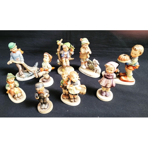 261 - SEVEN HUMMEL/GOEBEL FIGURINES
of children in various repose; together with a similar Friedel figurin... 