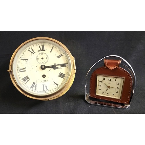 377 - SMITHS BULK HEAD EIGHT DAY  CLOCK 
the dial with Roman numerals, with keys, 17cm diameter; together ... 