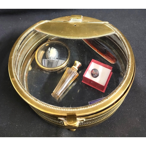 383 - TRENCH ART STYLE DISPLAY CASE
with spring loaded lid, the brass rim with inserts, raised on ball fee... 