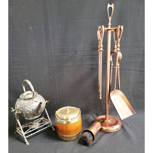 310 - EPNS SPIRIT KETTLE ON STAND
with a brass mounted oak biscuit barrel and a copper companion set (3)