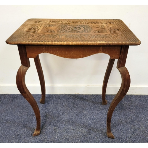 657 - CARVED MAHOGANY SIDE TABLE
the top with central monogram CMJ, surrounded by floral and motif detail ... 