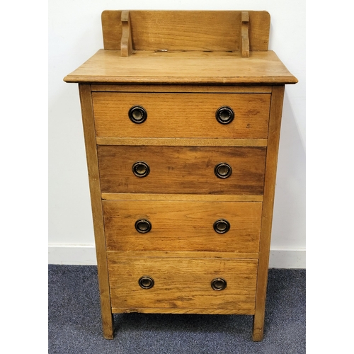 661 - LIGHT OAK CHEST OF FOUR DRAWERS
all with ring handles, the top with back panel which would have supp... 