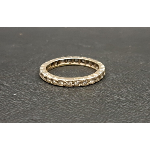 29 - CLEAR GEM SET ETERNITY RING
in nine carat gold, ring size L-M and approximately 3 grams