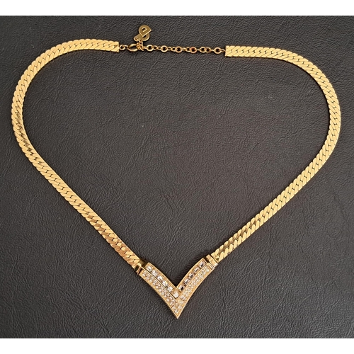 61 - VINTAGE CHRISTIAN DIOR NECKLACE
the paste set triangular arrow section flanked by gilt neck chain