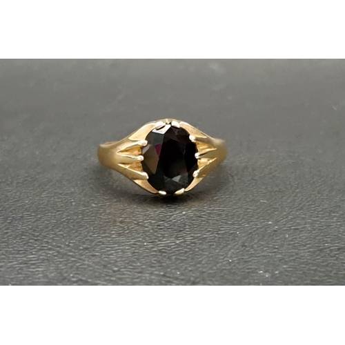 194 - SAPPHIRE SET SIGNET RING
the oval cut dark sapphire approximately 2cts, on nine carat gold shank, ri... 