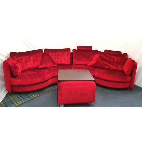 721 - TWO CONTEMPORARY SPANISH CURVED MODULAR SOFAS AND POUFFE BY FAMA
covered in rich red textured velvet... 