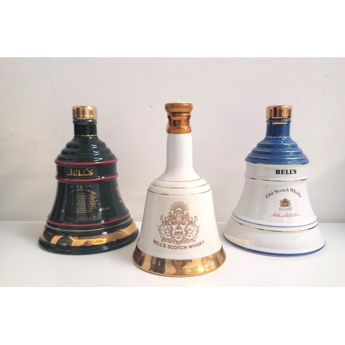 494 - THREE BELLS WADE DECANTERS 
Comprising one to commemorate the 90th birthday of Her Majesty Queen Eli... 