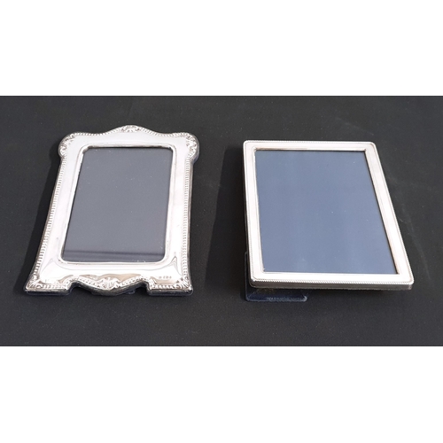 222 - TWO EASEL BACK SILVER PICTURE FRAMES
consisting of Mappin & Webb Birmingham 1991 with details around... 